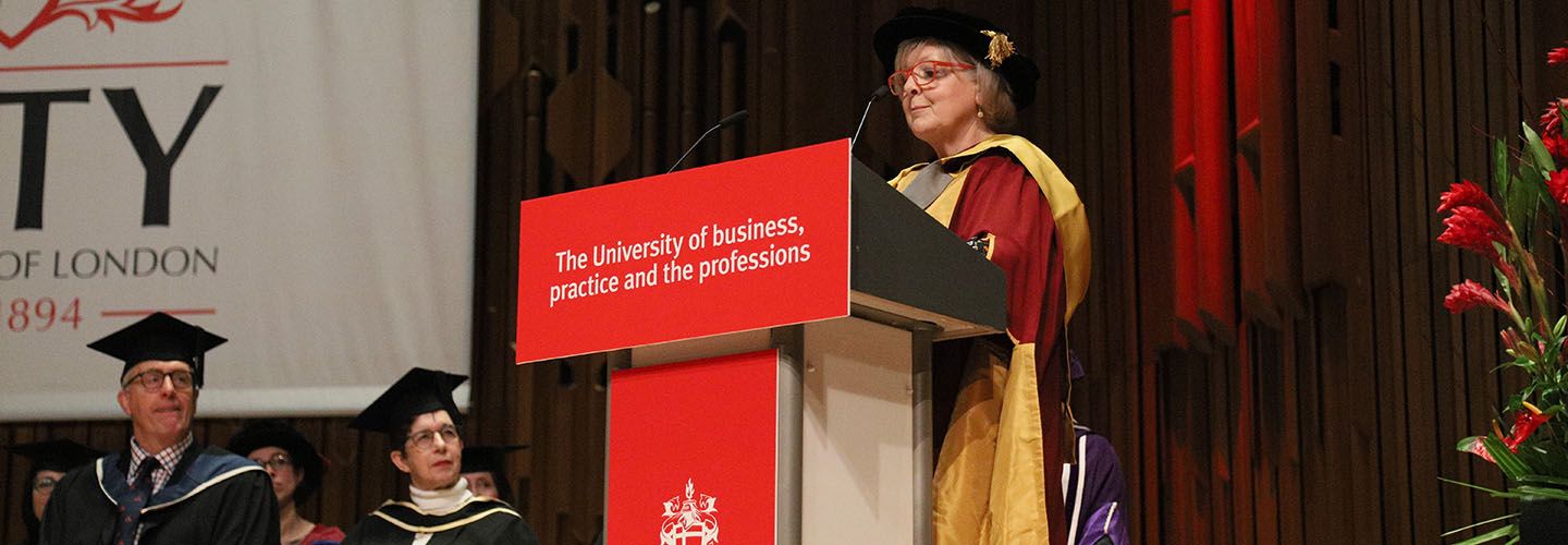 Dr Kathryn Gutteridge delivering her speech to School of Health & Psychological Sciences graduates.