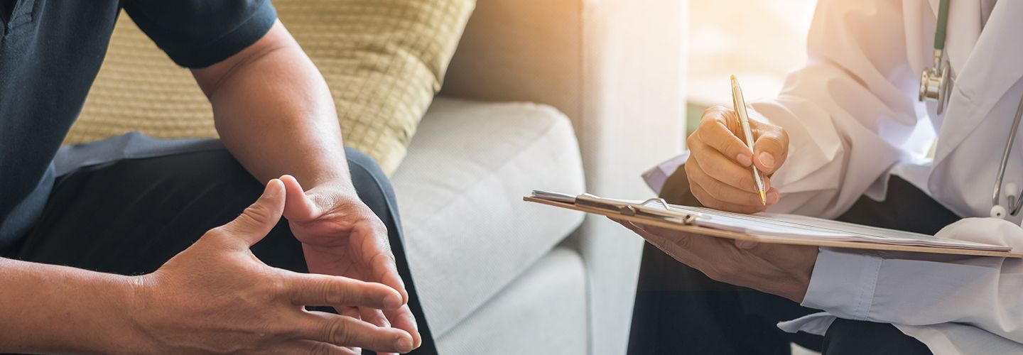 Counsellor addressing a patient 