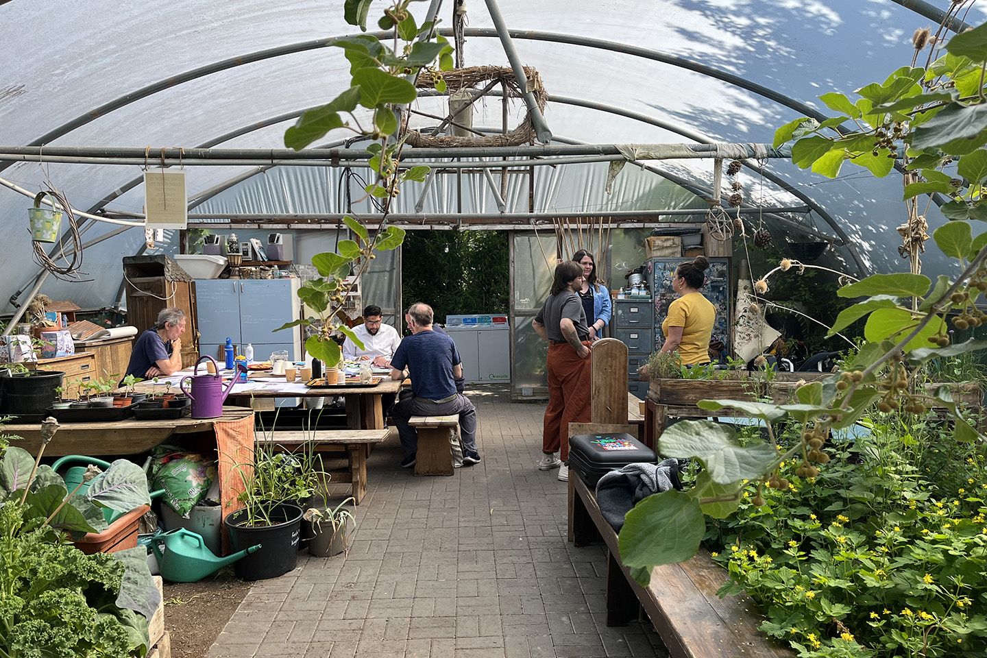 Craft session in a garden centre greenhouse.