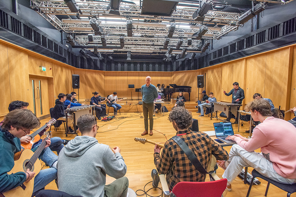 Students in a music ensemble with academic