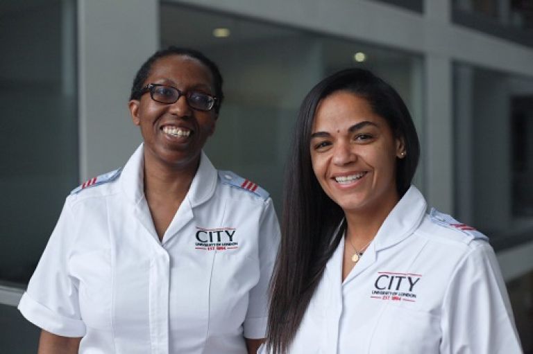 Jessica Semedo and Andrea McKenzie wearing their nursing uniforms