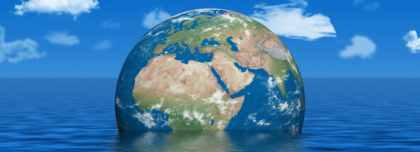 A globe Earth sinking into the ocean