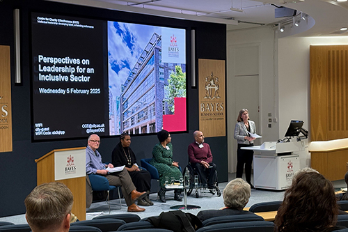 Alex Skailes introduces panellists at Perspectives on Leadership event