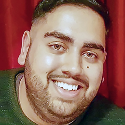 Usmaan Said smiling