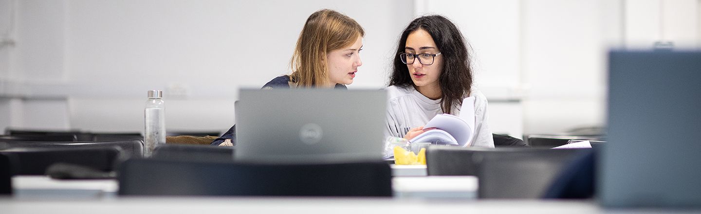 Two female students in training