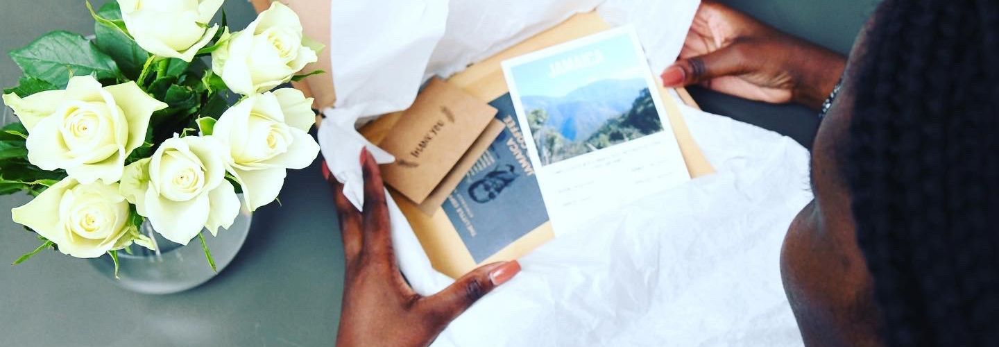 Female opening little coffee company gift box