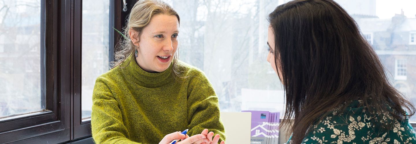 Counsellor talking to a student