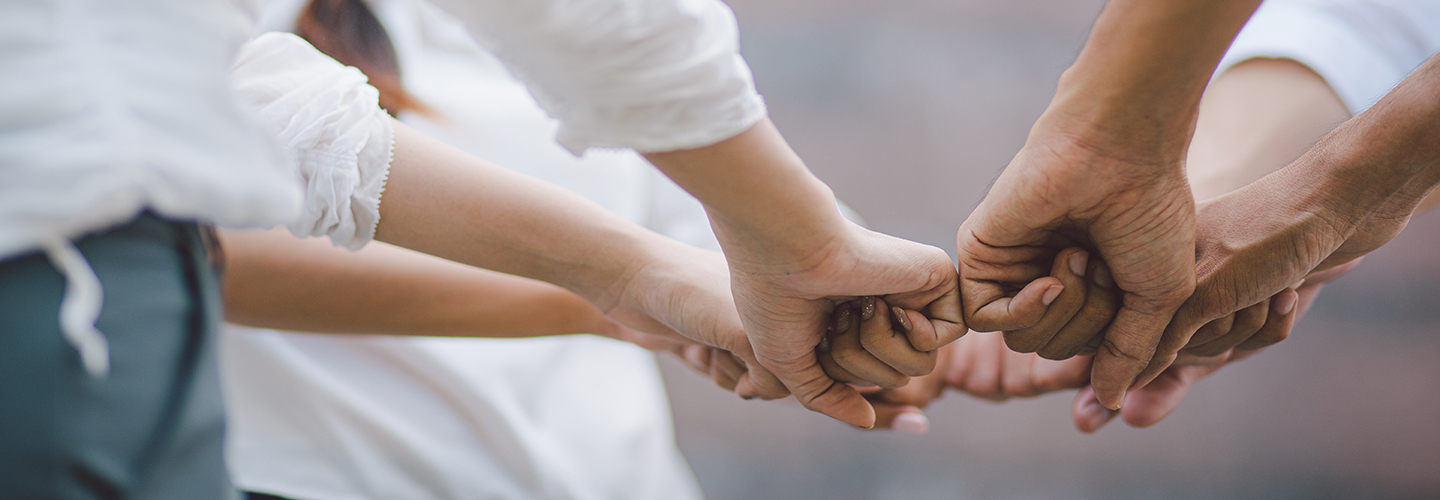 Fists bump to show inclusion