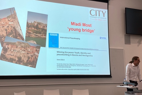 Steve Gillard speaks at his inaugural lecture about his time working in Bosnia and Herzegovina