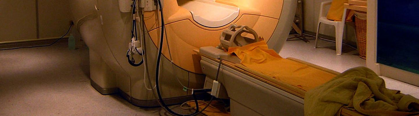 Modern MRI machine banner.