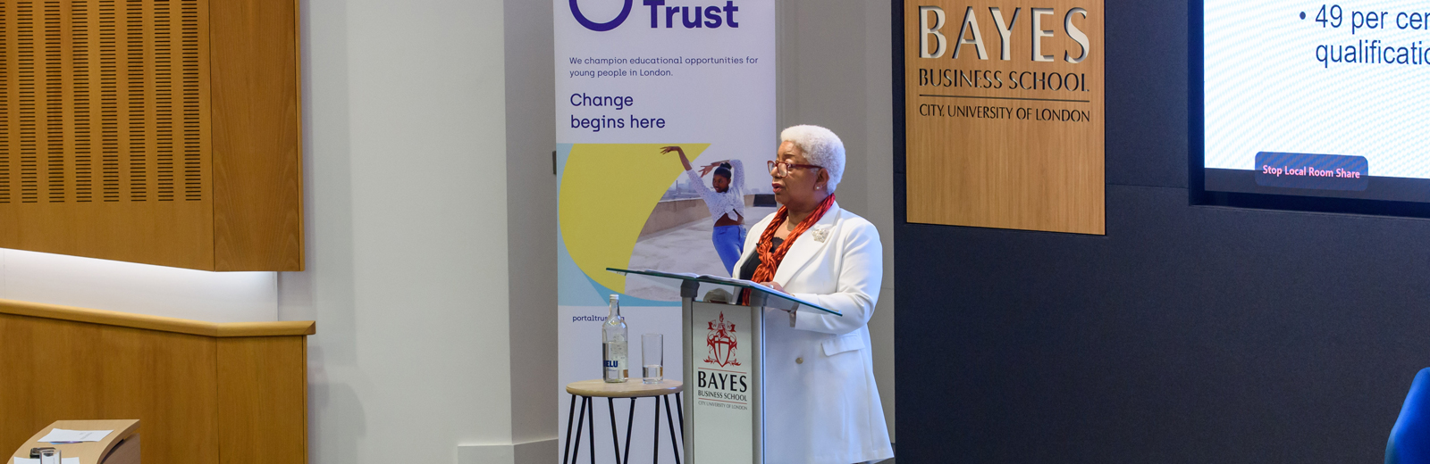 Colleen Harris on stage delivering the 2024 Portal Trust lecture