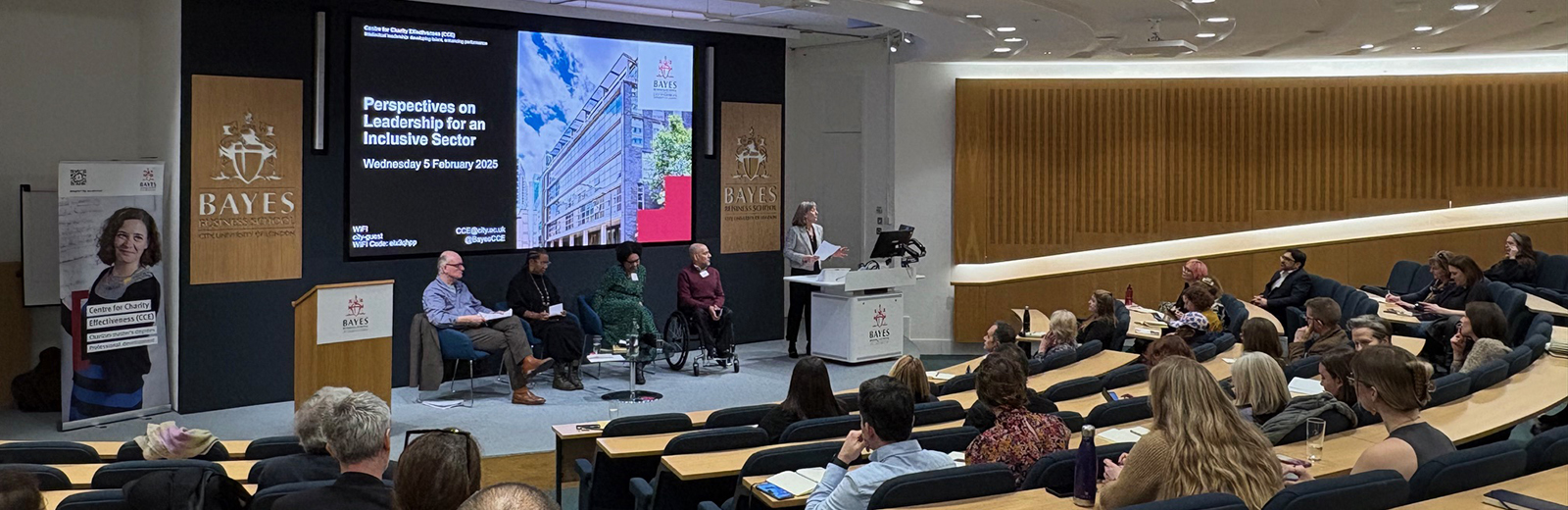 Alex Skailes introduces panellists at Perspectives on Leadership event