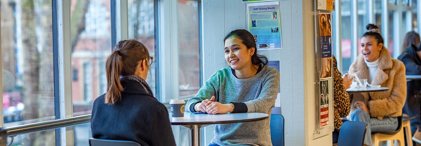 Bayes students interacting in a communal area