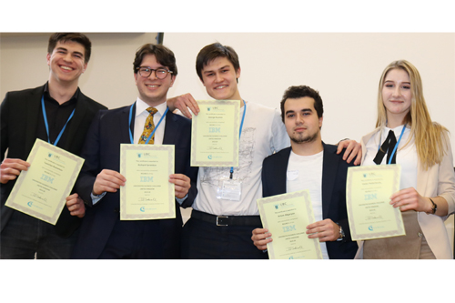 students line up with their certificates
