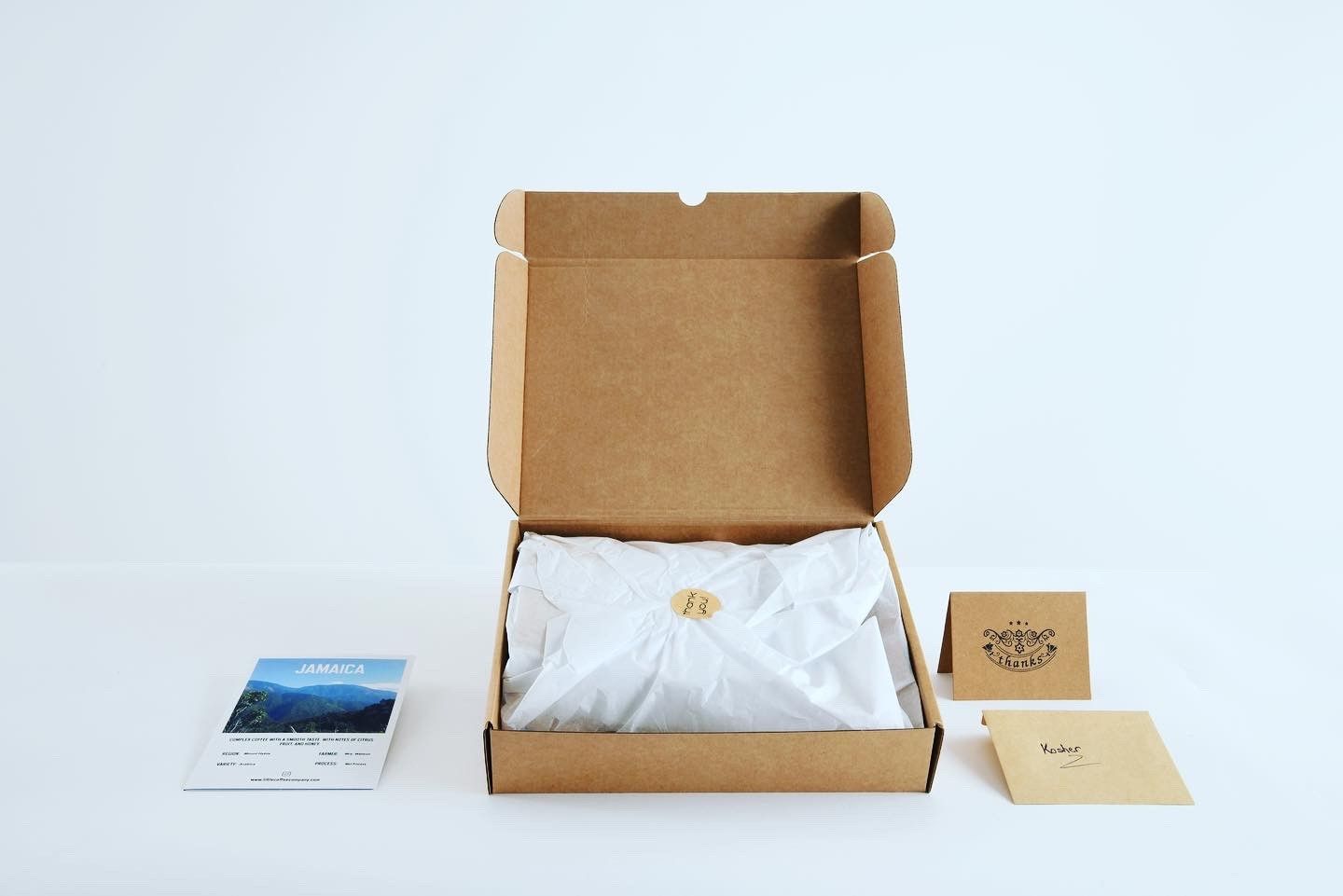 The little coffee company opened gift box with cards