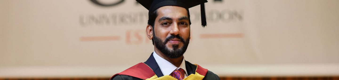 Abdul Qudoos Sohal (LLB Law 2020), poses in his gown