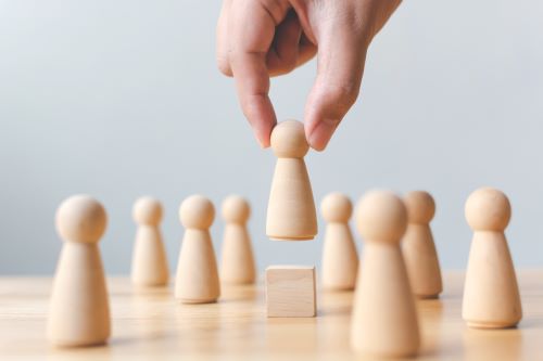 A bigger piece is flanked by smaller pieces