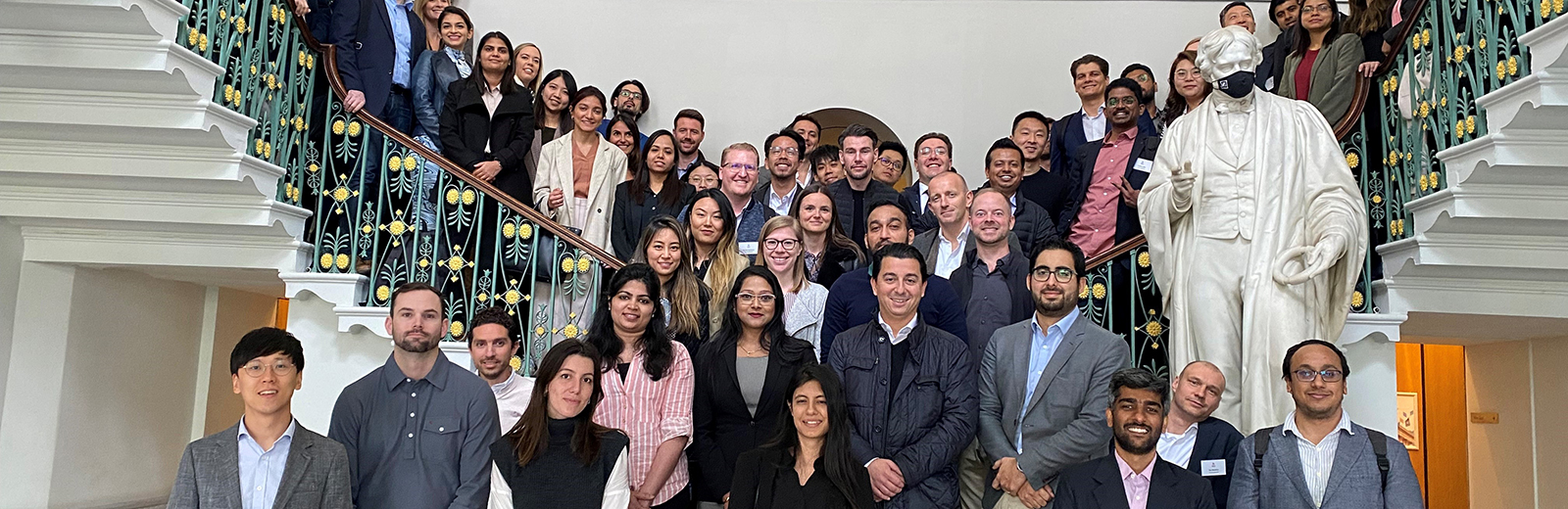 MBA Symposium participants standing on the steps of the Royal Institution