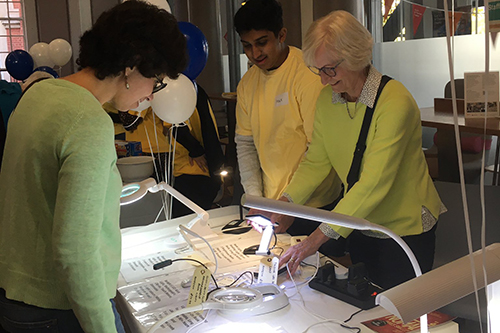 Dr Ahalya Subramanian visiting one of the stands at the low vision day event at St Thomas' Hospital