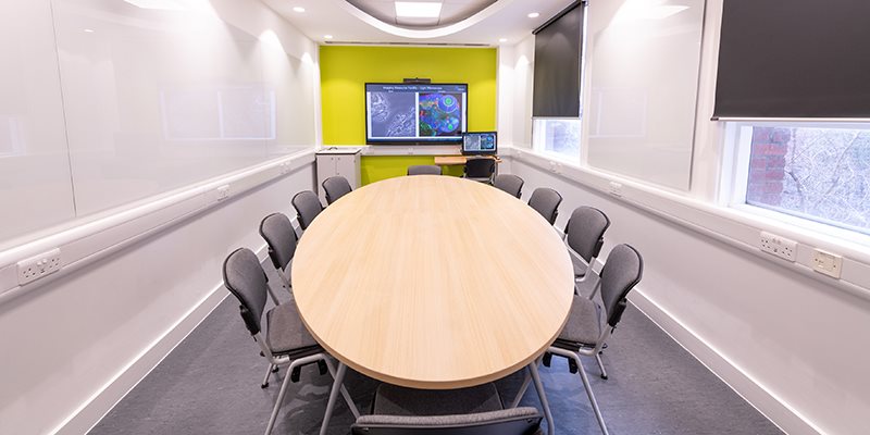 Empty base teaching room with chairs positioned round a table