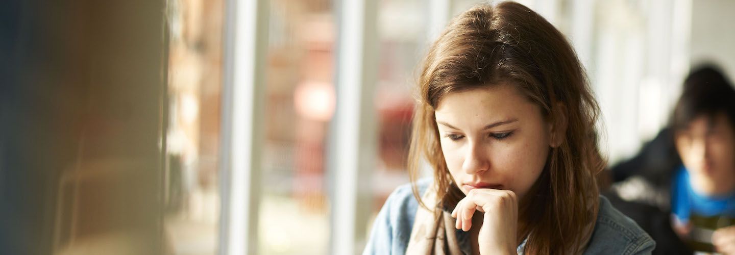 Female student studying on a laptop