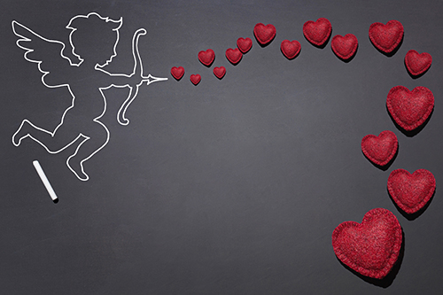 Cupid firing an arrow with hearts