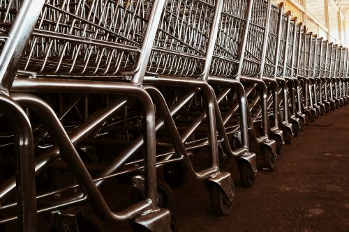A row of empty shopping trolleys