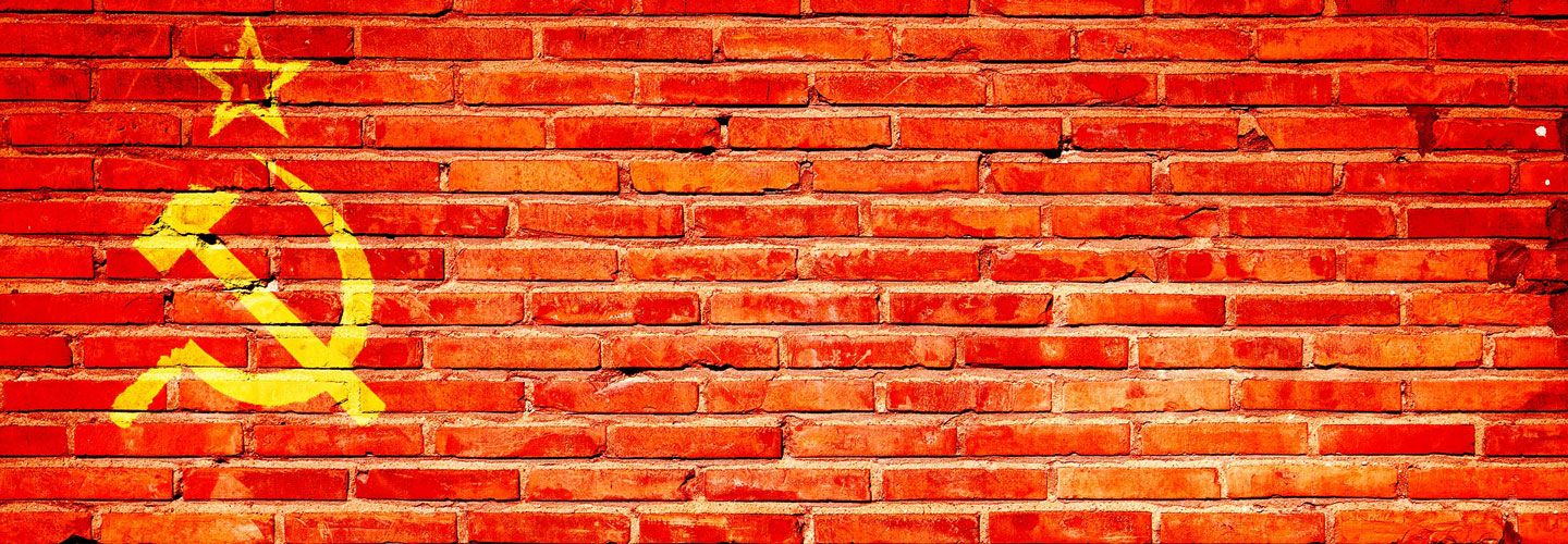 Soviet flag on brick wall