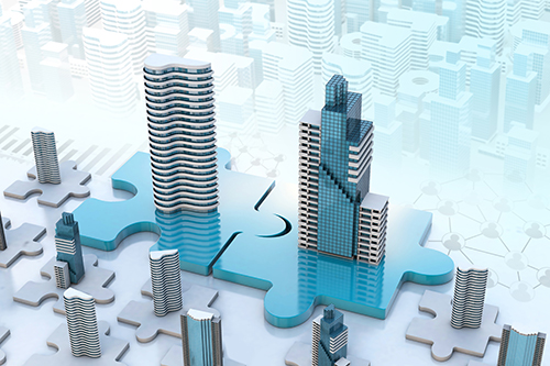 Two buildings locked together by puzzle pieces
