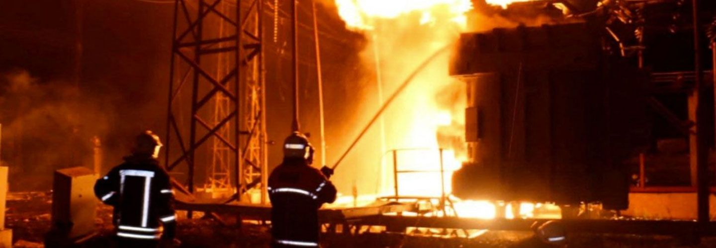 Firefighters work at a site of a thermal power plant damaged by a Russian missile strike, amid Russia's attack on Ukraine, in Kharkiv, Ukraine September 11, 2022