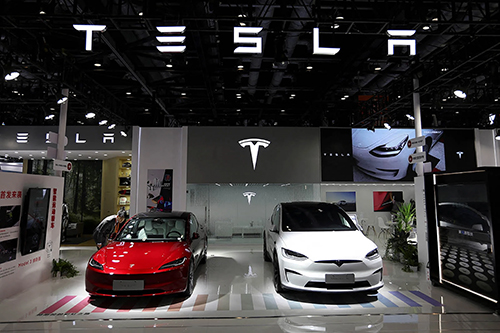 Tesla cars in a showroom