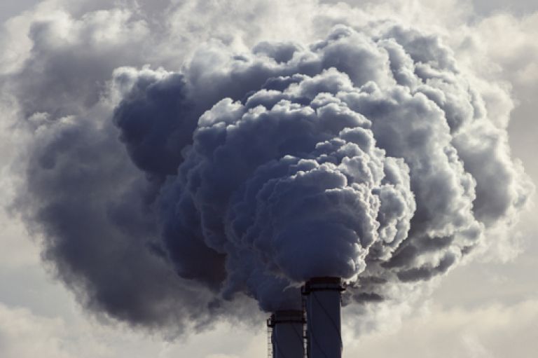  Air pollution spews from power plant chimneys 