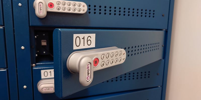 Drawer for laptop charging in locker tower