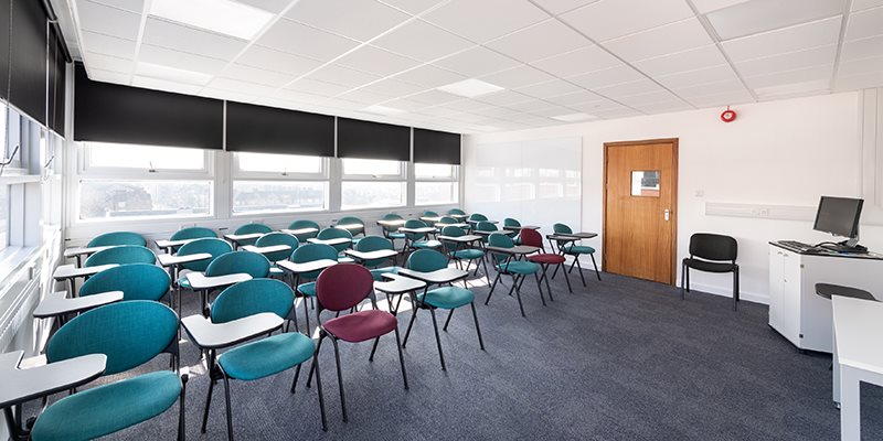 Empty teaching room set up with chairs for students