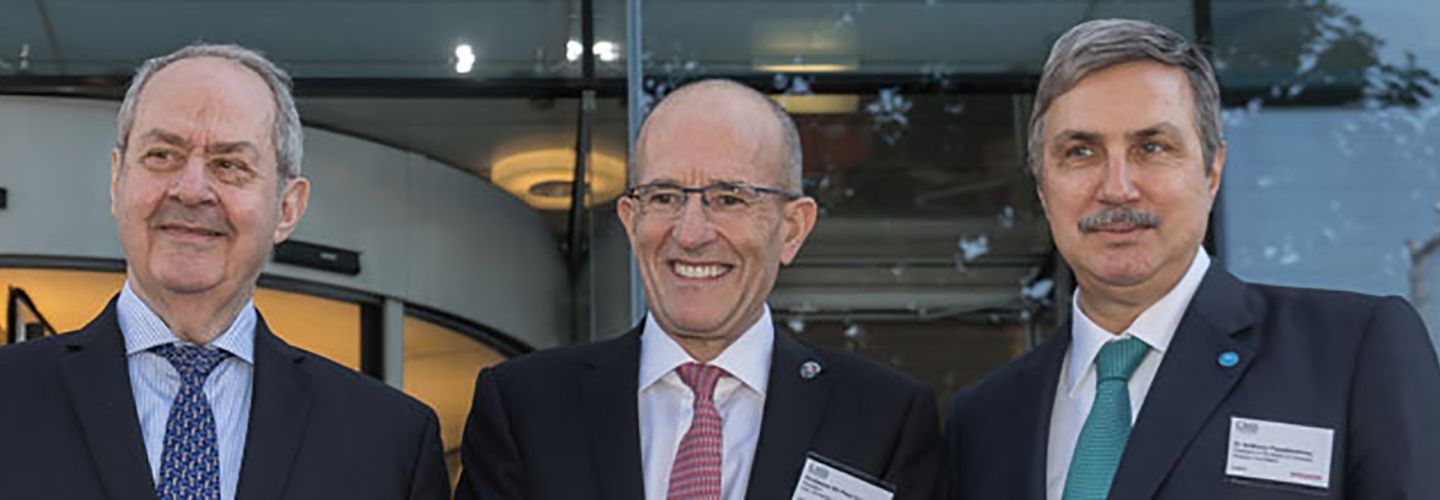 Professor Grammenos, Sir Paul Curran and Dr Anthony Papadimitrio standing together