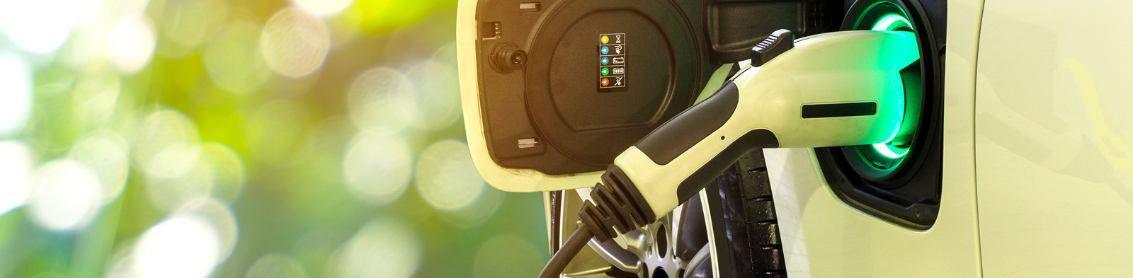 An electric car is refuelled 