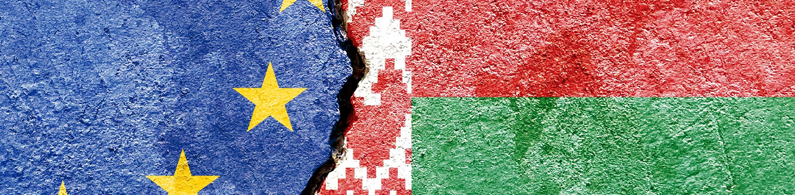 EU and Belarus flags separated by thick black border line