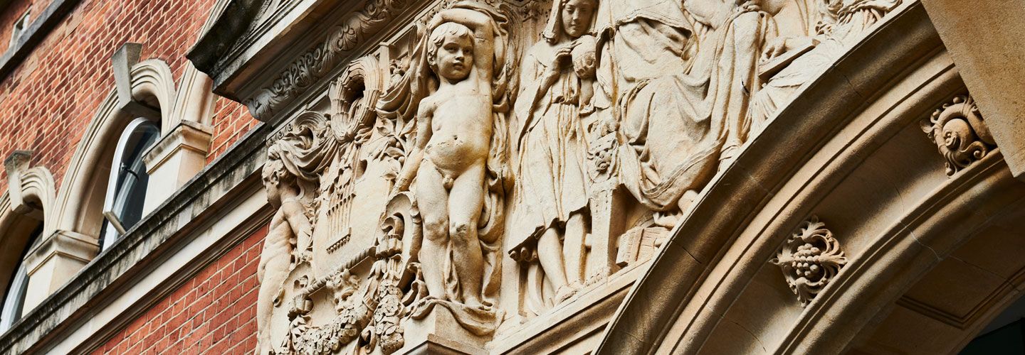 Close up of College Building frieze