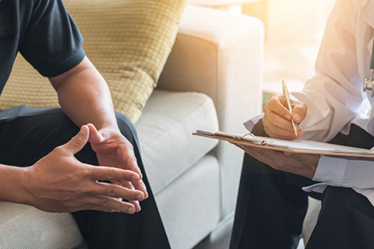 Counsellor talking to patient