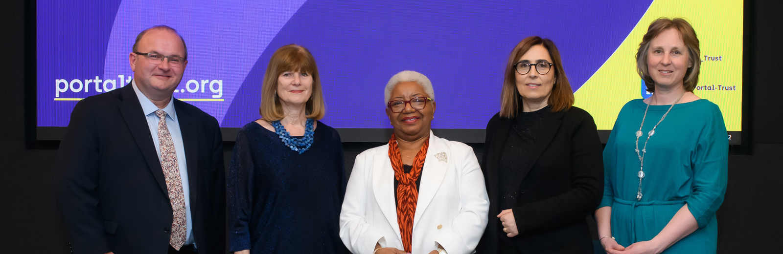 Colleen Harris on stage with leaders from Bayes and The Portal Trust