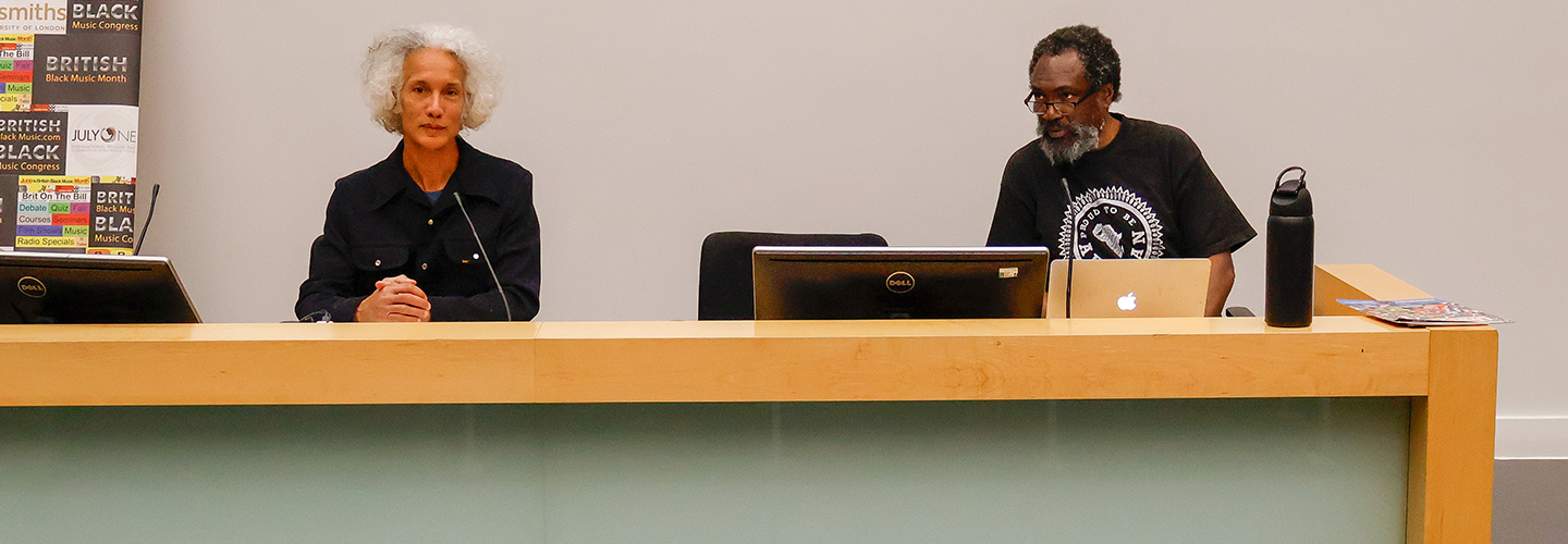 Two men at a panel