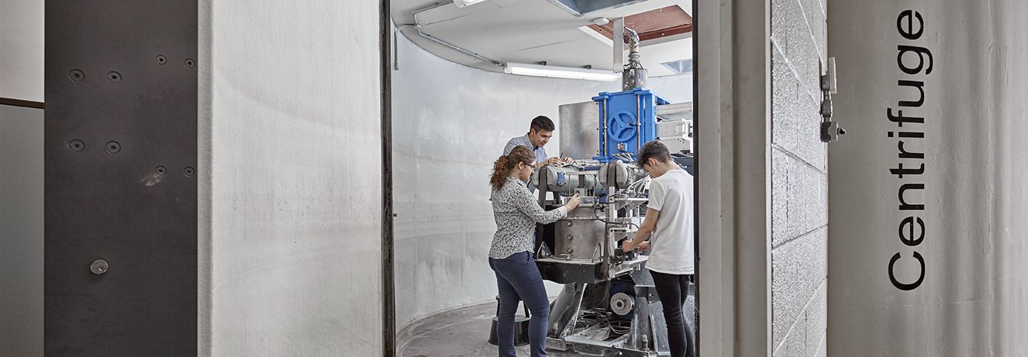 Students operate the centrifuge at City in its own room.