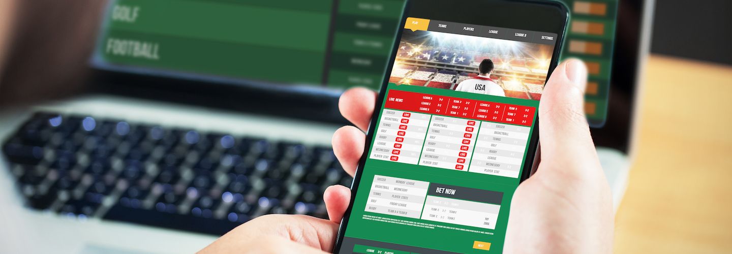 A smartphone with a gambling app on screen