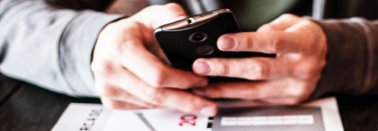 Teenager using a mobile phone