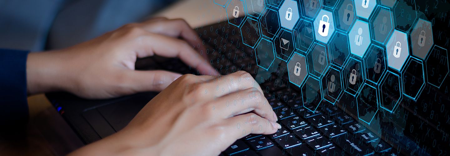 Woman's hands typing on a laptop keyboard with a digital overlay representing a security layer with lock icons.