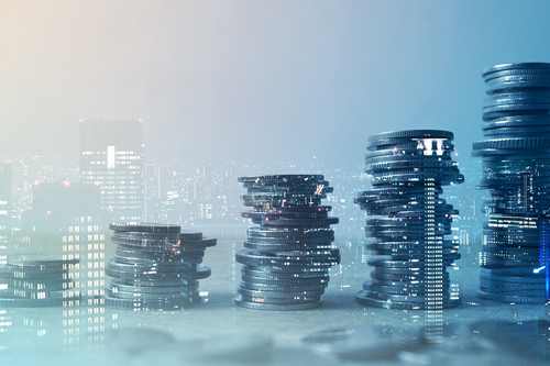 A pile of coins and buildings