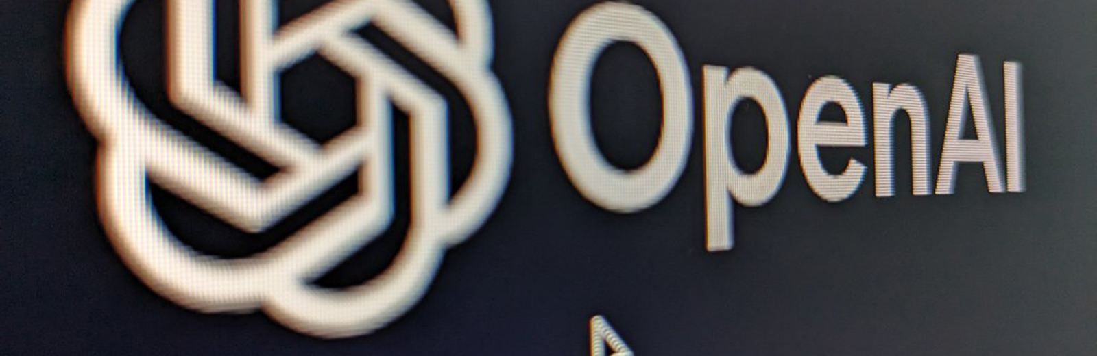 OpenAI logo on a screen