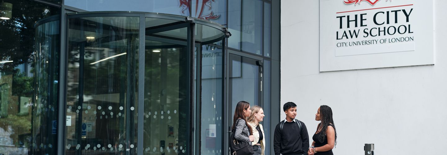 Students in front of the Law School building. 