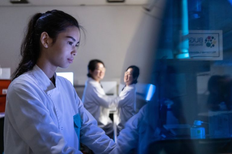 Genomics student in lab