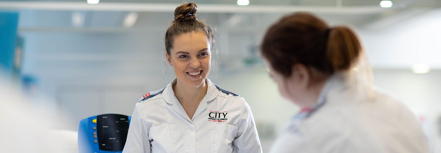 Student nurses with patient 